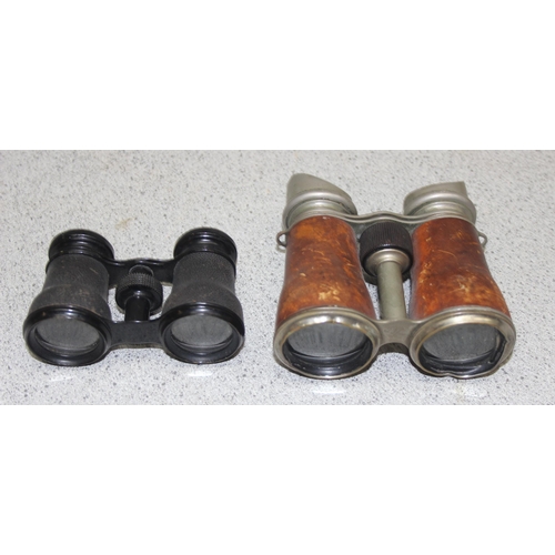 701 - 2 pairs of antique field glasses or binoculars, one pair possibly a WW1 private purchase pair