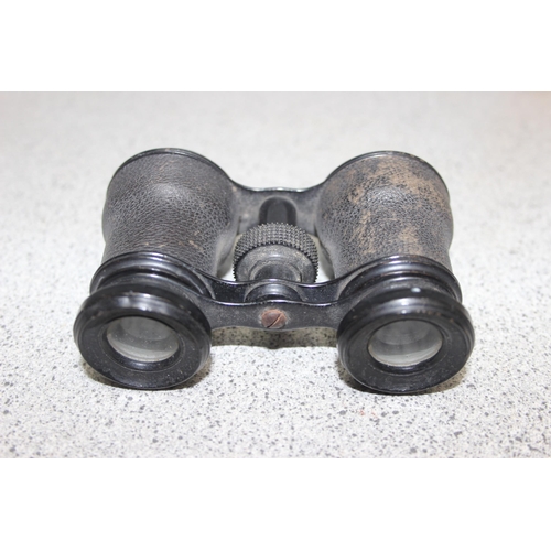 701 - 2 pairs of antique field glasses or binoculars, one pair possibly a WW1 private purchase pair