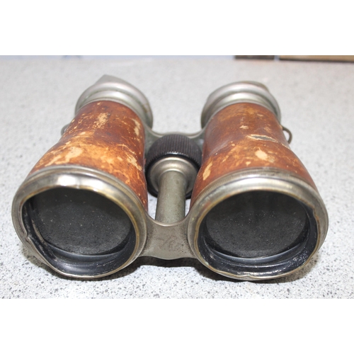 701 - 2 pairs of antique field glasses or binoculars, one pair possibly a WW1 private purchase pair