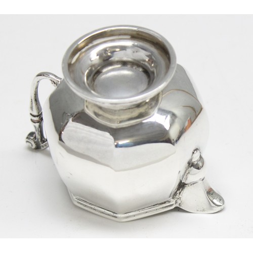 1014A - A small silver cream jug of octagonal form, London 1915 by Thomas Bradbury & Son, approx 73.66g gros... 