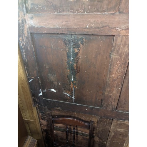 105 - Antique mahogany glazed bookcase over large shelved cupboard, approx 220cm