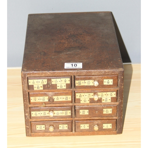 10 - A small early 20th century 8 drawer wooden engineers chest box currently holding drill bits, approx ... 