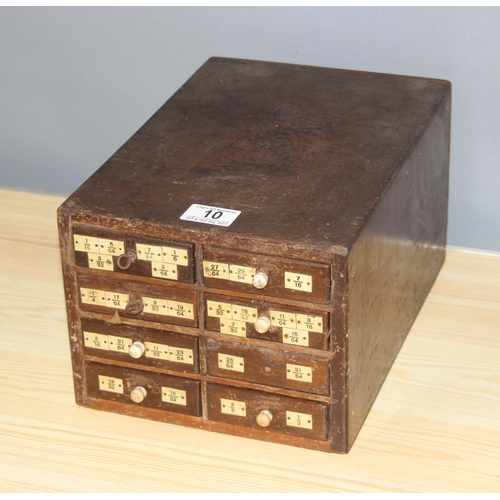 10 - A small early 20th century 8 drawer wooden engineers chest box currently holding drill bits, approx ... 