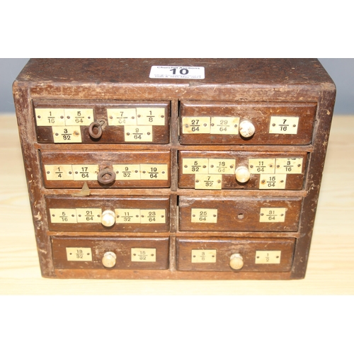 10 - A small early 20th century 8 drawer wooden engineers chest box currently holding drill bits, approx ... 