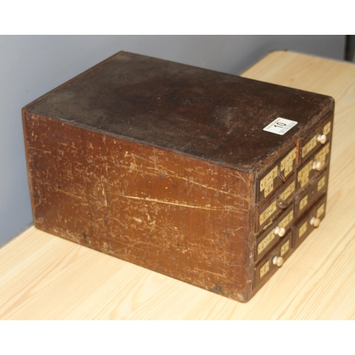 10 - A small early 20th century 8 drawer wooden engineers chest box currently holding drill bits, approx ... 