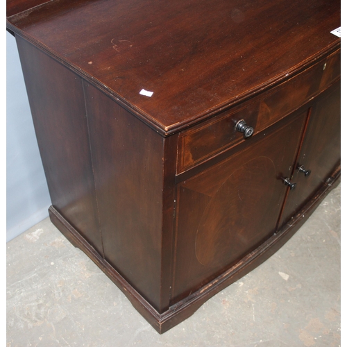 12 - An Edwardian mahogany hall cupboard or small sideboard formed as a single drawer over a cupboard bas... 