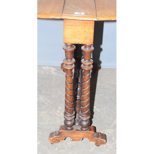 15 - An antique mahogany dropleaf table on unusual turned legs, approx 91cm wide by approx 116cm when ope... 