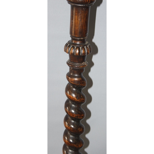 23 - An antique oak jardinière stand with barleytwist support, approx 109cm tall