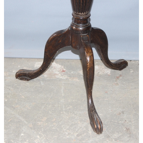 23 - An antique oak jardinière stand with barleytwist support, approx 109cm tall