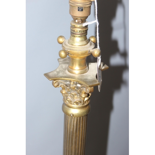 234 - A heavy vintage brass column standard lamp, approx 140cm tall