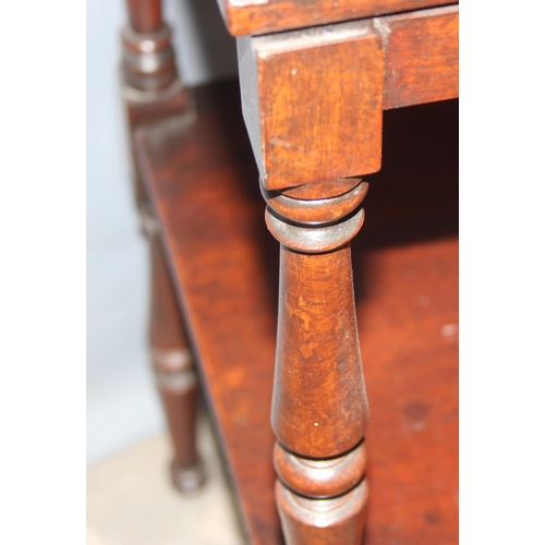 25 - An antique mahogany side table with adjustable lectern or bookrest top, approx 47cm wide