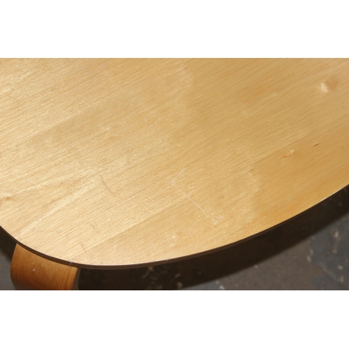 28 - A nest of 2 retro style bentwood tables, largest approx 74cm wide