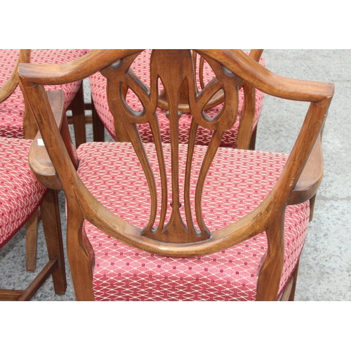 30 - A set of 10 19th century shield backed mahogany dining chairs (2 carver & 8 dining), with patterned ... 