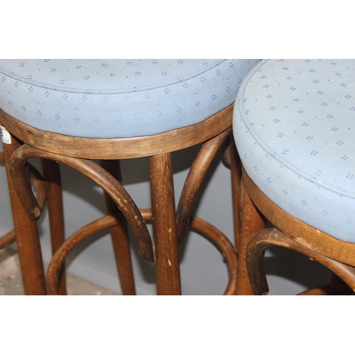 38 - A set of 4 vintage Thonet style bentwood stools with stuffed seats