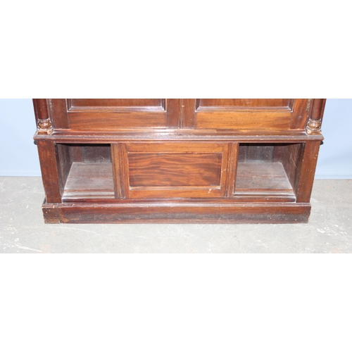 4 - A late 19th century mahogany hall cupboard with 2 shelves in the upper section over a lower cupboard... 