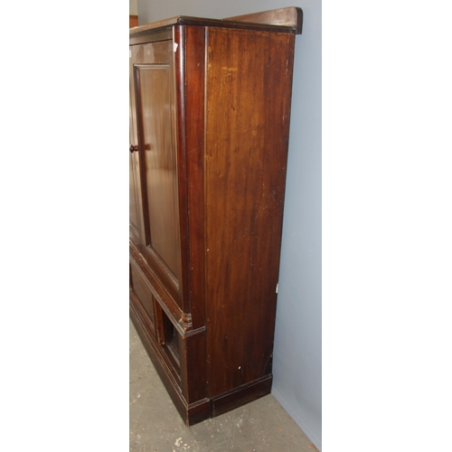 4 - A late 19th century mahogany hall cupboard with 2 shelves in the upper section over a lower cupboard... 