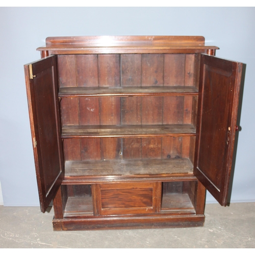 4 - A late 19th century mahogany hall cupboard with 2 shelves in the upper section over a lower cupboard... 