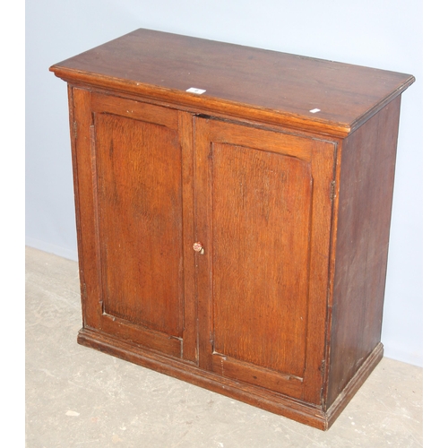 6 - An early 20th century oak hall cupboard with 2 shelves, approx 79cm tall x 77cm wide