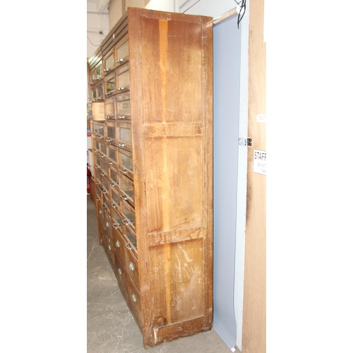 7 - A pair of early 20th Century haberdashery shop fitters display cabinet with plaque for 'J.C. King Lt... 