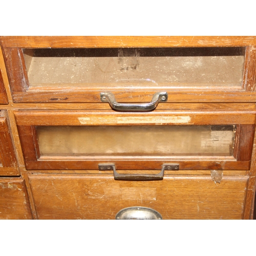 7 - A pair of early 20th Century haberdashery shop fitters display cabinet with plaque for 'J.C. King Lt... 