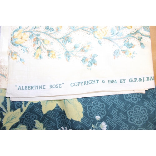 209 - Box of upholstery and curtain material