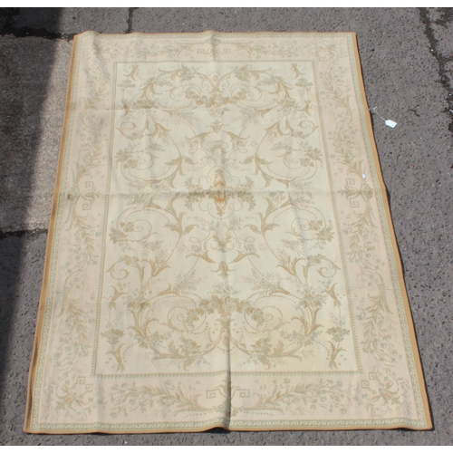 214 - Laura Ashley cream ground rug with floral decoration, measures 230cm x 155cm