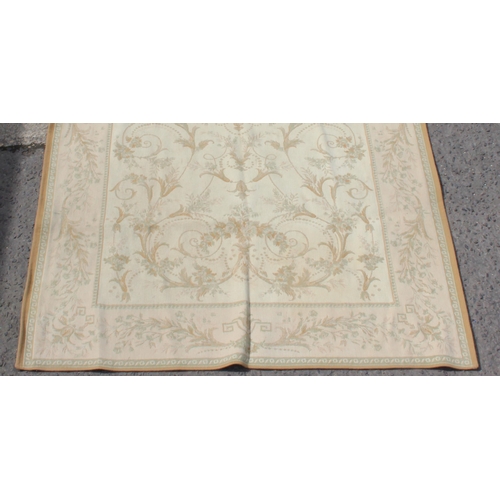 214 - Laura Ashley cream ground rug with floral decoration, measures 230cm x 155cm