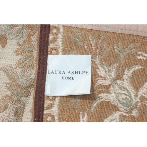 214 - Laura Ashley cream ground rug with floral decoration, measures 230cm x 155cm