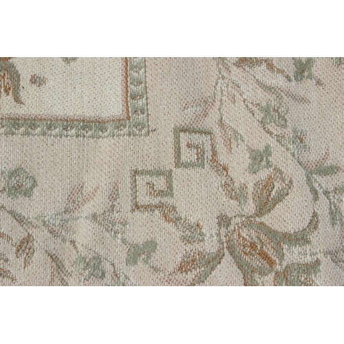 214 - Laura Ashley cream ground rug with floral decoration, measures 230cm x 155cm