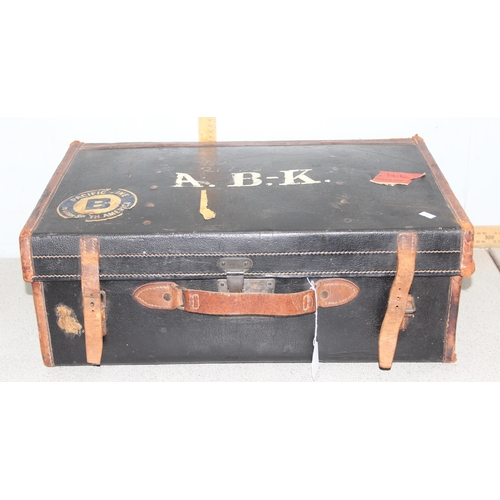 279 - A large vintage canvas and leather suitcase by Barratt Brothers of Oxford St, approx 61cm wide