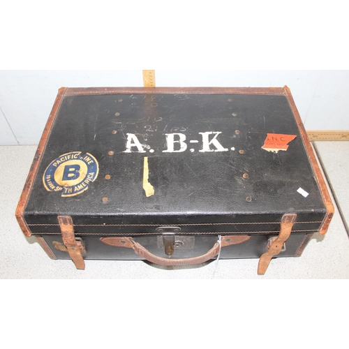 279 - A large vintage canvas and leather suitcase by Barratt Brothers of Oxford St, approx 61cm wide