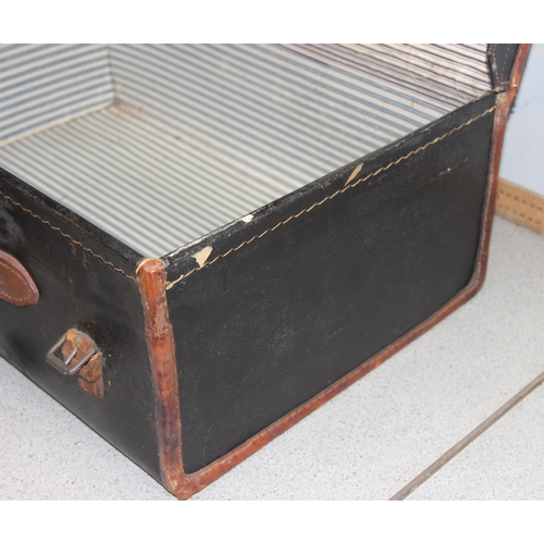 279 - A large vintage canvas and leather suitcase by Barratt Brothers of Oxford St, approx 61cm wide