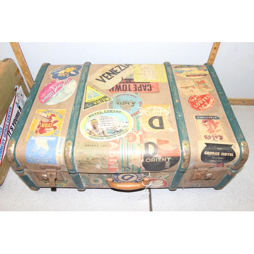 280 - 2 vintage canvas and wooden suitcases, both with a huge variety of vintage labels