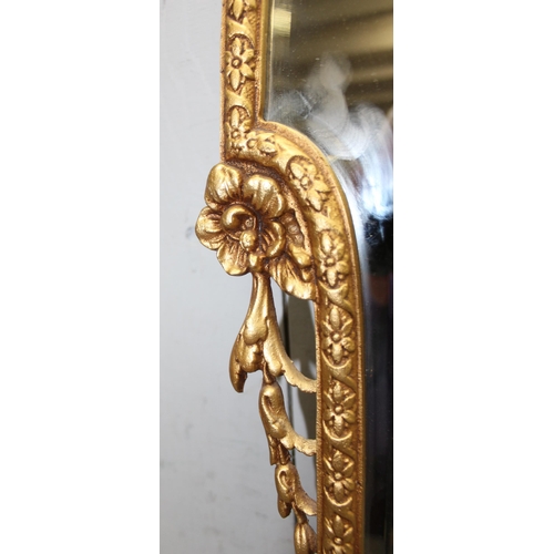 424 - A mid-century gilt metal Rococo style wall mirror by Peerart, approx 96cm x 46cm