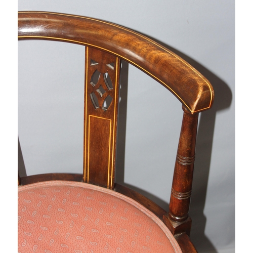 41 - A pair of early 20th century horse shoe shaped backed bedroom chairs with pink upholstered seats