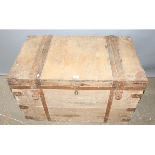 44 - An antique iron bound wooden trunk, strong box or silver chest, approx 107cm wide x 60cm deep x 66cm... 