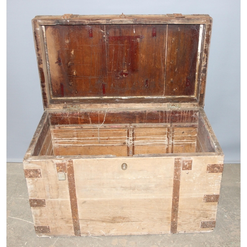 44 - An antique iron bound wooden trunk, strong box or silver chest, approx 107cm wide x 60cm deep x 66cm... 