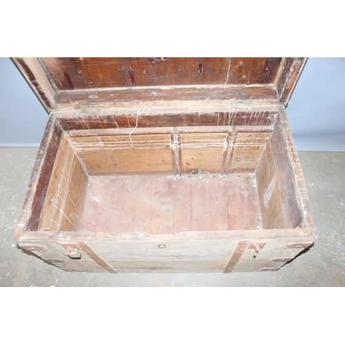 44 - An antique iron bound wooden trunk, strong box or silver chest, approx 107cm wide x 60cm deep x 66cm... 