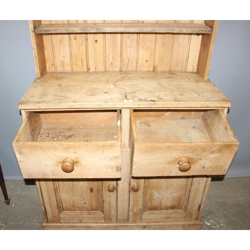 46 - A Victorian pine farmhouse kitchen dresser comprising of 2 drawers over 2 cupboards, approx 211cm ta... 