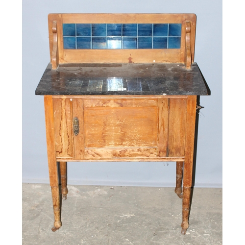 49 - An early 20th century pine and marble topped wash stand with tile back, approx 77cm wide