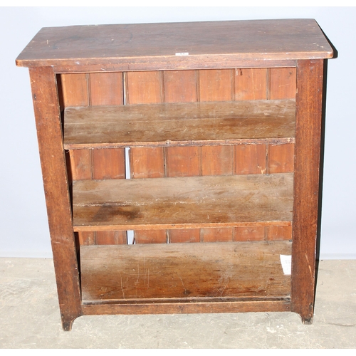 51 - An antique stained pine bookcase, approx 96cm wide