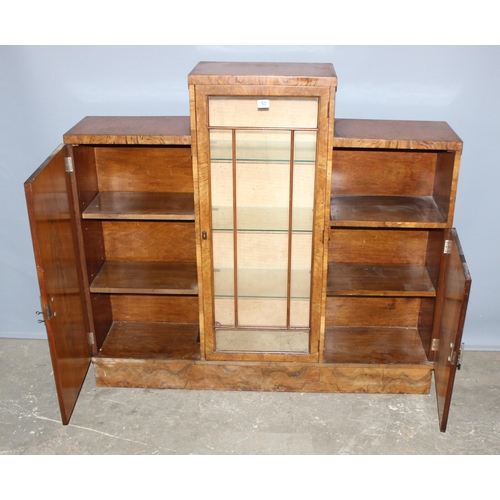 53 - An Art Deco period walnut display cabinet of unusual form, with key, approx 136cm wide