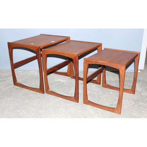 64 - A retro G-Plan nest of tables, the largest approx 54cm wide