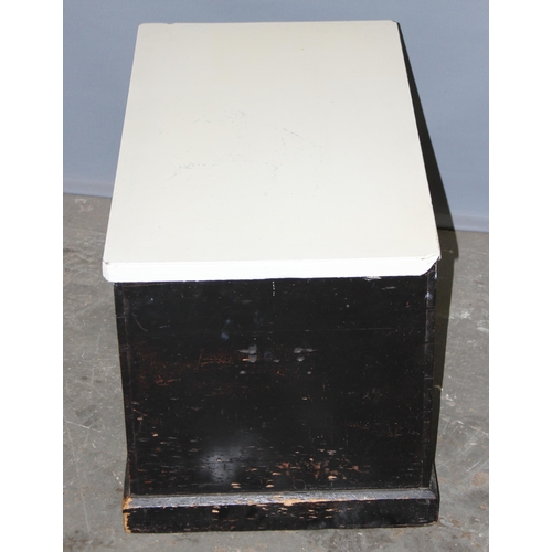 76 - An antique painted pine trunk with black painted base and white painted top, approx 79cm wide x 47cm... 