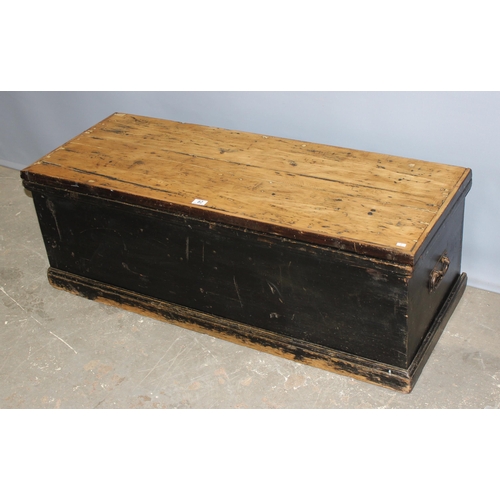 82 - A large antique painted pine trunk with scrub top, approx 126cm wide x 45cm tall x 50cm deep