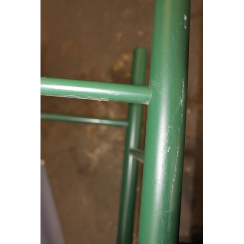 85 - A pair of green painted rush seated stools