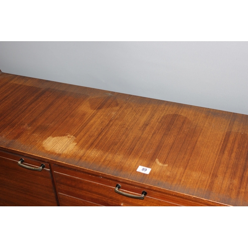 89 - A retro Meredew sideboard with 3 central drawers flanked by 2 cupboards, approx 166cm wide