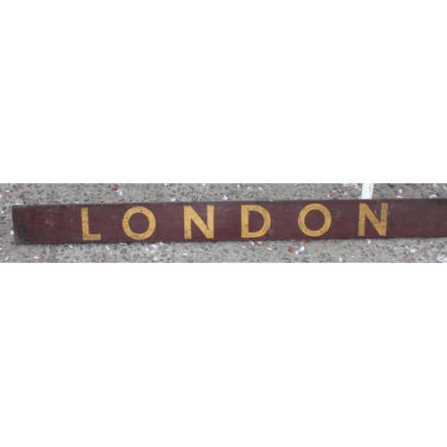 439 - An extremely large painted wooden railway sign 