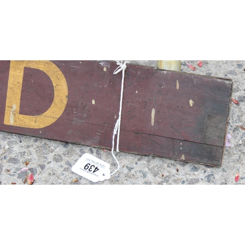 439 - An extremely large painted wooden railway sign 