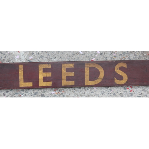 440 - An extremely large painted wooden railway sign 